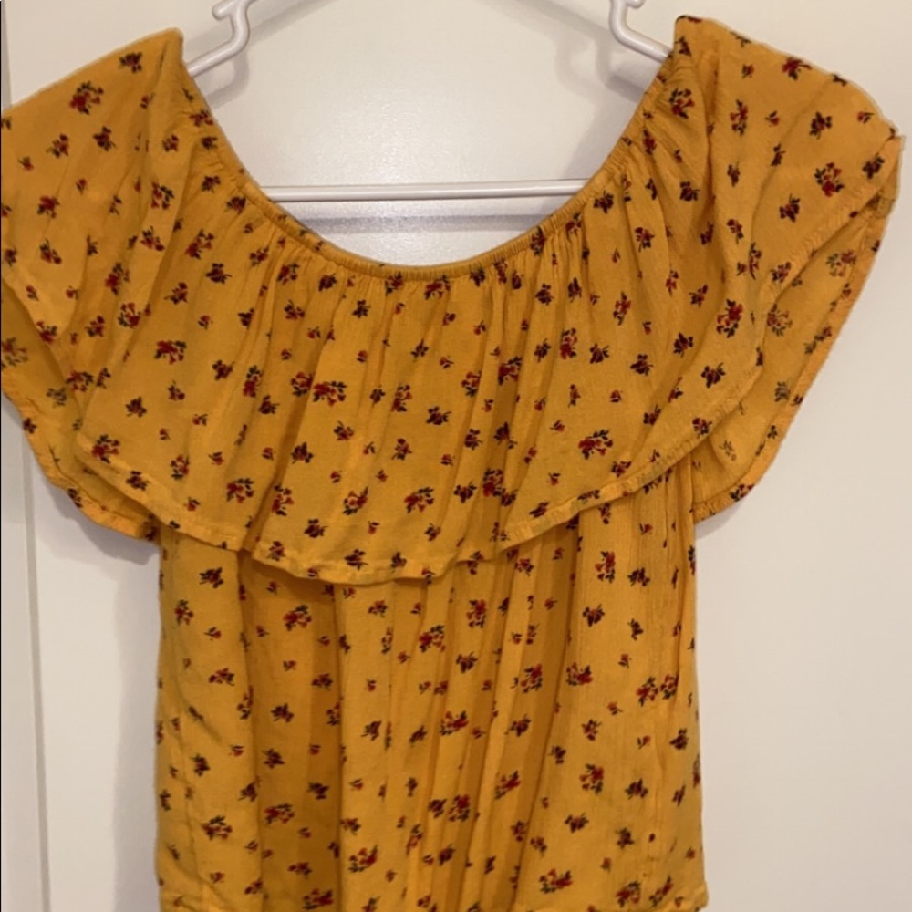 a cute off the shoulder yellow with flowers